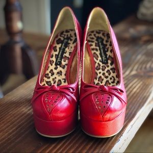 But Another Innocent Tale Red Retro Pumps